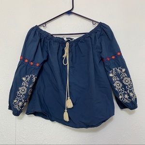 Off the shoulder blue shirt